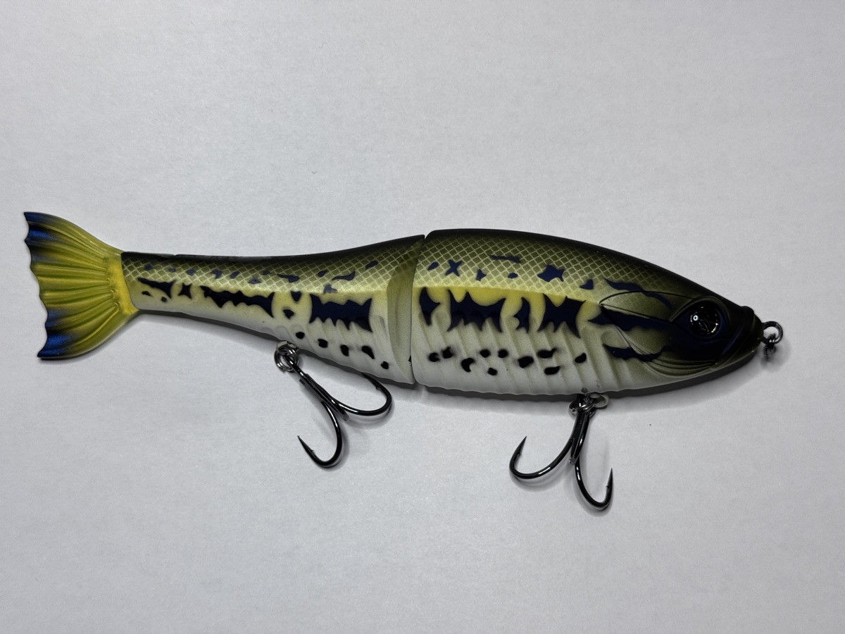 A handmade jointed fishing lure
